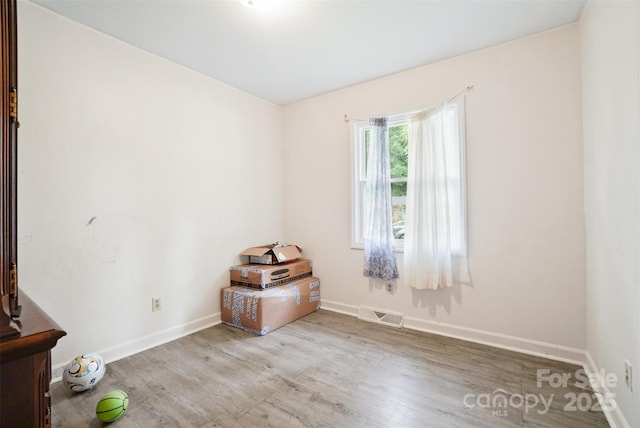 924 Carrington Dr, Charlotte, NC 28214 - unfurnished room featuring wood finished floors and baseboards
