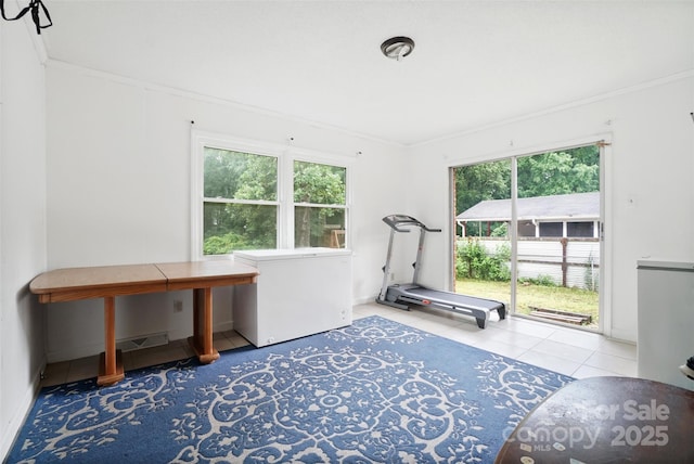 924 Carrington Dr, Charlotte, NC 28214 - workout area featuring ornamental molding and tile patterned flooring