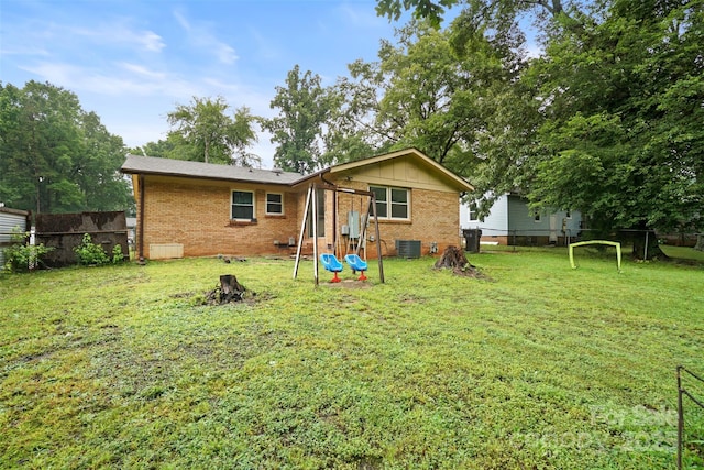 924 Carrington Dr, Charlotte, NC 28214 - rear view of property featuring brick siding and cooling unit