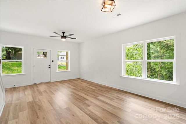 605 Poplar St, Shelby, NC 28150 - foyer with ceiling fan, light wood-style floors, and baseboards