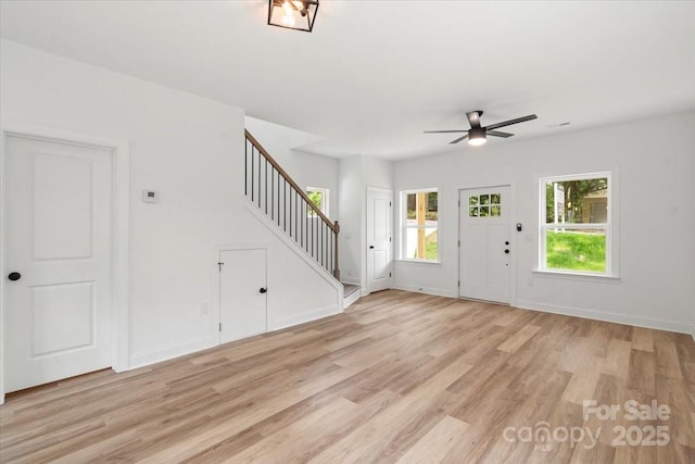 605 Poplar St, Shelby, NC 28150 - foyer with stairway, light wood-type flooring, ceiling fan, and baseboards