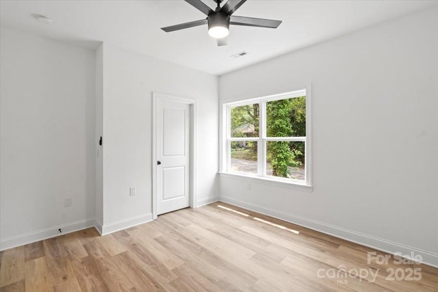 605 Poplar St, Shelby, NC 28150 - unfurnished bedroom with light wood finished floors, baseboards, and a ceiling fan