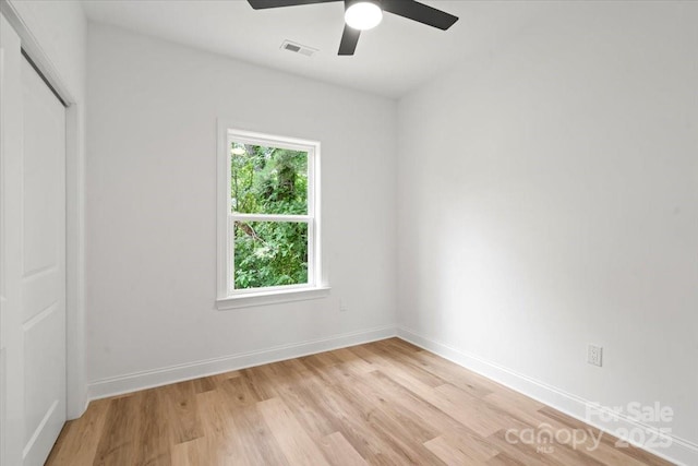605 Poplar St, Shelby, NC 28150 - unfurnished bedroom featuring light wood-style floors, a closet, baseboards, and ceiling fan