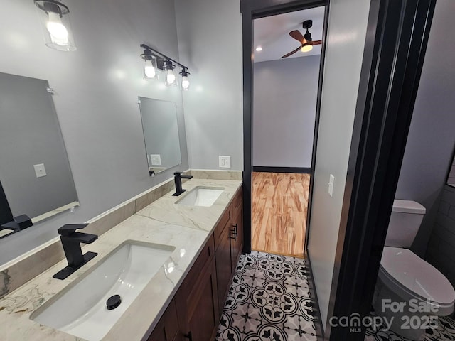 1076 Table View Dr Unit 55, Morganton, NC 28655 - bathroom with double vanity, toilet, ceiling fan, and tile patterned flooring