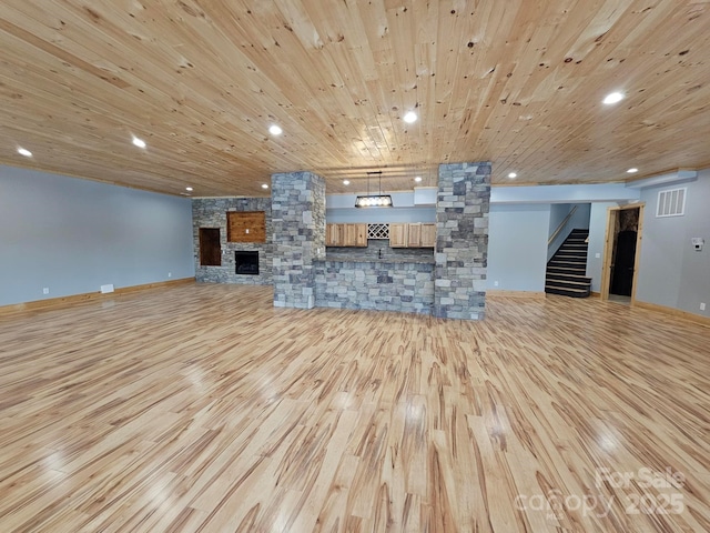 1076 Table View Dr Unit 55, Morganton, NC 28655 - unfurnished living room featuring light wood-type flooring, stairway, wood ceiling, recessed lighting, and a fireplace
