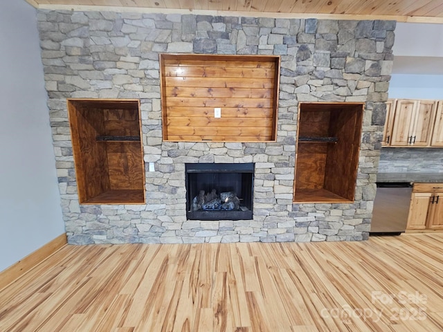 1076 Table View Dr Unit 55, Morganton, NC 28655 - unfurnished living room with wood finished floors and a fireplace