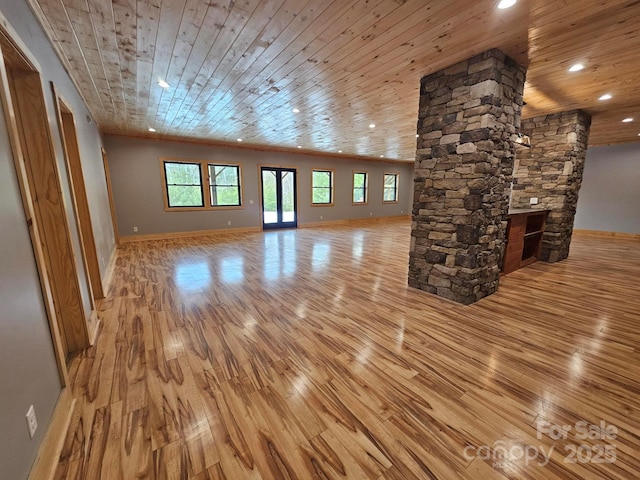 1076 Table View Dr Unit 55, Morganton, NC 28655 - unfurnished living room with hardwood / wood-style floors, baseboards, wood ceiling, ornate columns, and recessed lighting