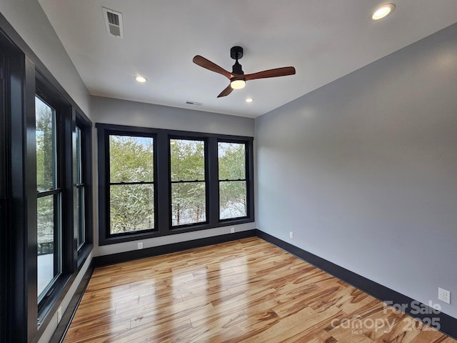 1076 Table View Dr Unit 55, Morganton, NC 28655 - spare room with healthy amount of natural light, light wood-type flooring, ceiling fan, baseboards, and recessed lighting