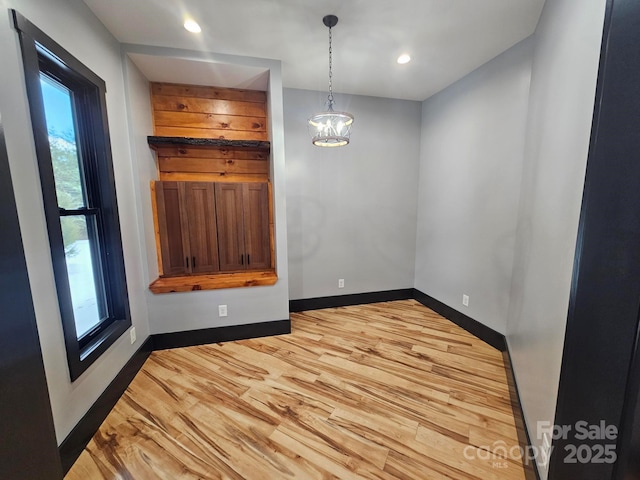 1076 Table View Dr Unit 55, Morganton, NC 28655 - unfurnished dining area featuring light wood-type flooring, plenty of natural light, baseboards, recessed lighting, and a chandelier