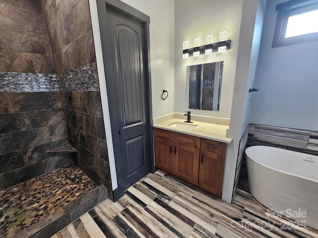 1076 Table View Dr Unit 55, Morganton, NC 28655 - full bathroom with a soaking tub, vanity, a tile shower, and wood finished floors