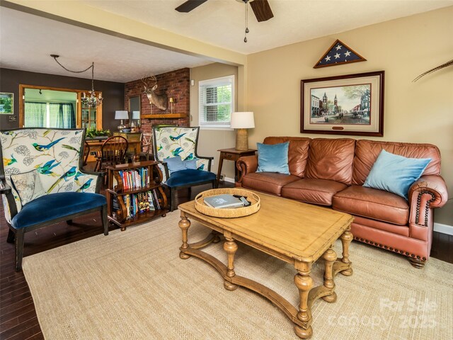26 Melton Rd, Candler, NC 28715 - living area featuring ceiling fan, wood finished floors, and a fireplace