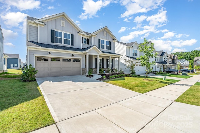 11116 Godwit Ln, Charlotte, NC 28278 - craftsman-style house featuring board and batten siding, a garage, a residential view, covered porch, and driveway