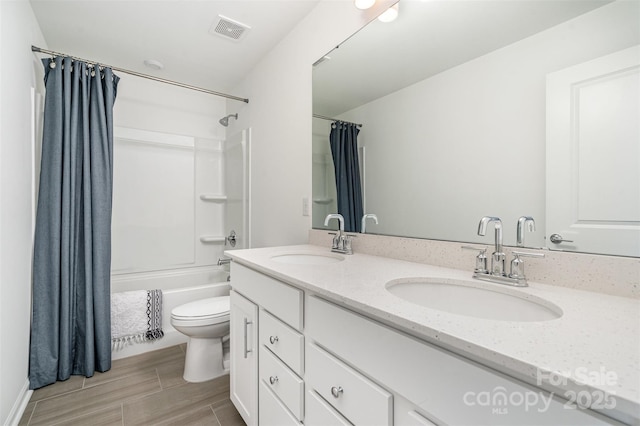 11116 Godwit Ln, Charlotte, NC 28278 - bathroom featuring toilet, shower / bathtub combination with curtain, double vanity, and wood finish floors