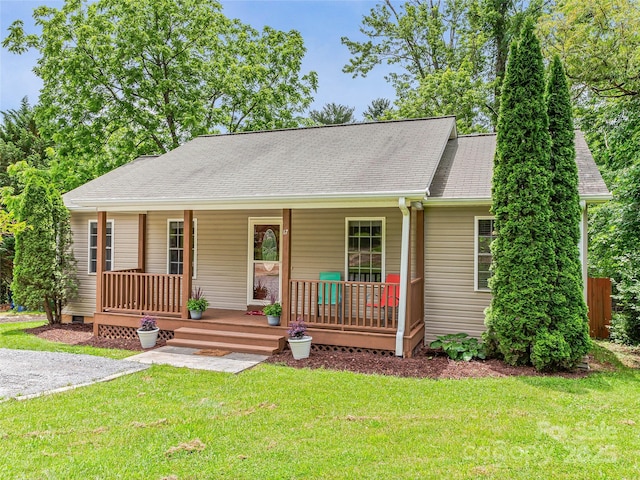 17 Fieldtop Ln, Arden, NC 28704 - view of front of house featuring covered porch, a front lawn, and a shingled roof