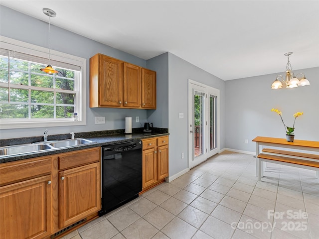 17 Fieldtop Ln, Arden, NC 28704 - kitchen with dishwasher, light tile patterned floors, dark countertops, and brown cabinets
