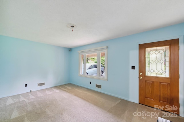 46 Donna Dale Ave SE, Concord, NC 28025 - carpeted foyer featuring baseboards