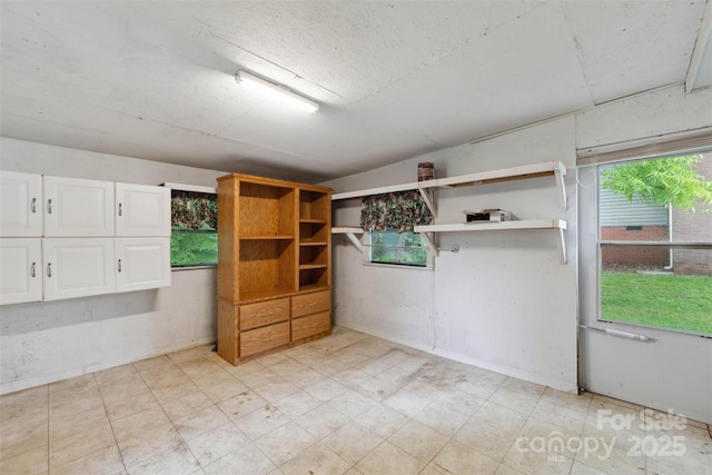 46 Donna Dale Ave SE, Concord, NC 28025 - unfurnished room with plenty of natural light and light floors