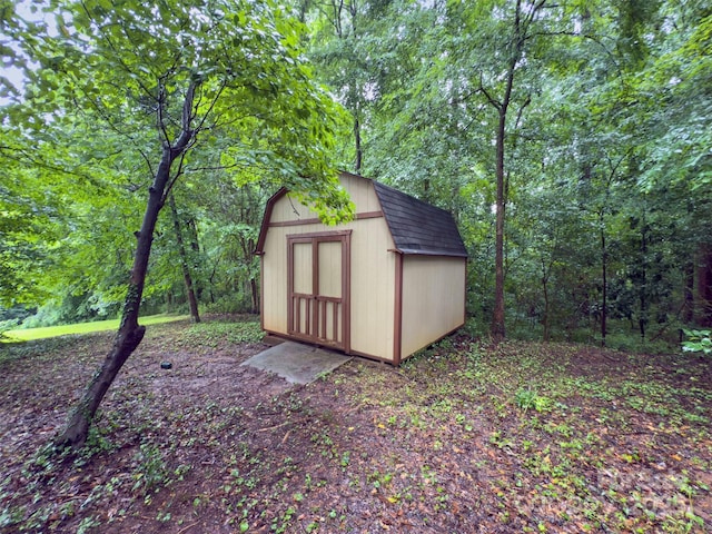 46 Donna Dale Ave SE, Concord, NC 28025 - view of shed with a wooded view