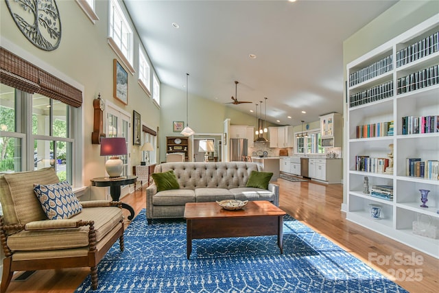 63 Greenridge Rd, Weaverville, NC 28787 - living room featuring plenty of natural light, ceiling fan, light wood finished floors, high vaulted ceiling, and recessed lighting