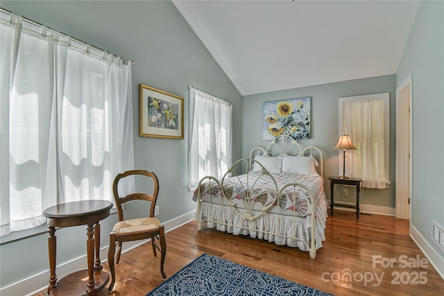63 Greenridge Rd, Weaverville, NC 28787 - bedroom featuring vaulted ceiling and wood finished floors