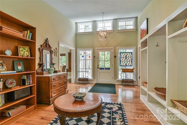 63 Greenridge Rd, Weaverville, NC 28787 - entryway with a chandelier, light wood-type flooring, and a towering ceiling