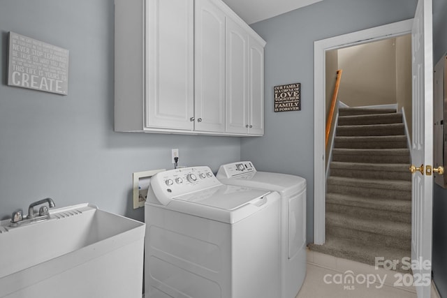 9717 Waterton Ct, Huntersville, NC 28078 - laundry room with cabinet space, separate washer and dryer, and light tile patterned floors