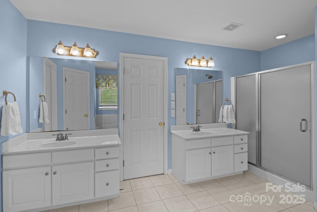 9717 Waterton Ct, Huntersville, NC 28078 - full bath featuring a shower stall, two vanities, and tile patterned flooring