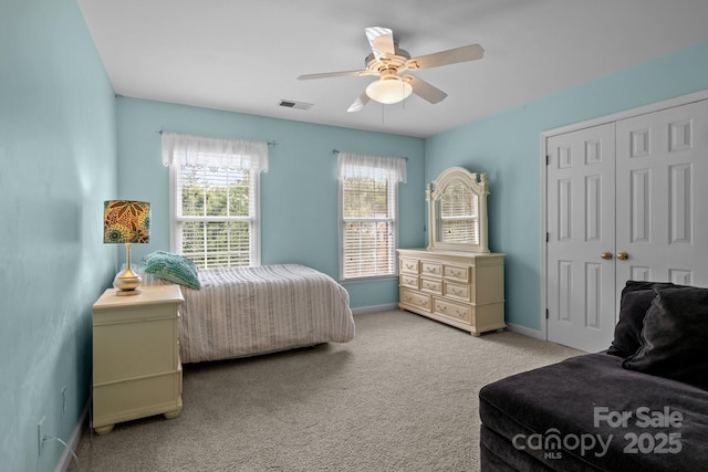 9717 Waterton Ct, Huntersville, NC 28078 - carpeted bedroom with baseboards, a ceiling fan, and a closet