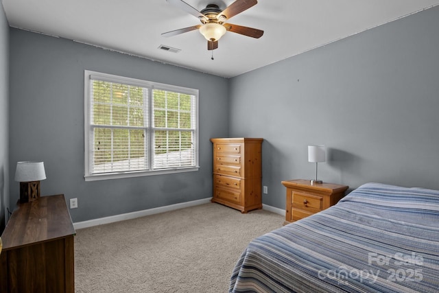 9717 Waterton Ct, Huntersville, NC 28078 - carpeted bedroom featuring baseboards and a ceiling fan