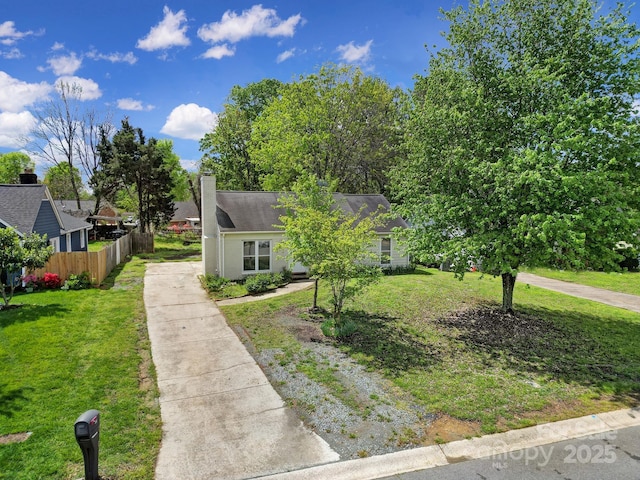 8520 Mission Hills Rd, Charlotte, NC 28227 - view of front facade with concrete driveway and a chimney