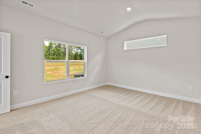 7225 Jerimoth Dr, Charlotte, NC 28215 - carpeted spare room with vaulted ceiling, baseboards, and recessed lighting
