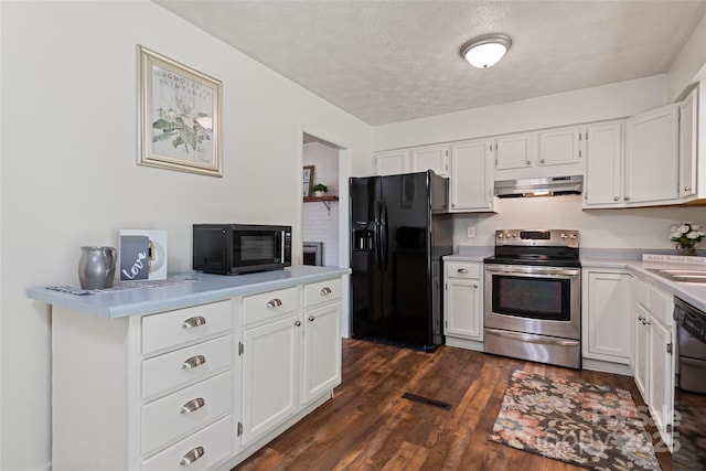 40 Autumn St, Canton, NC 28716 - kitchen with black appliances, dark wood-style flooring, light countertops, white cabinetry, and a textured ceiling
