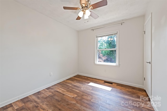 40 Autumn St, Canton, NC 28716 - unfurnished room with baseboards, wood finished floors, a ceiling fan, and a textured ceiling