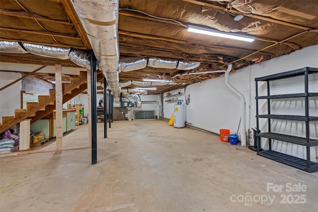 40 Autumn St, Canton, NC 28716 - unfinished basement with electric water heater and stairway