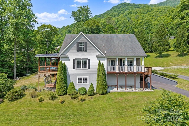 491 Paint Fork Rd, Barnardsville, NC 28709 - back of house featuring a deck, a forest view, a yard, and stairway