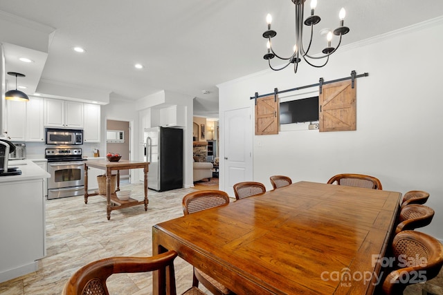 491 Paint Fork Rd, Barnardsville, NC 28709 - dining area featuring ornamental molding, a barn door, recessed lighting, and a chandelier