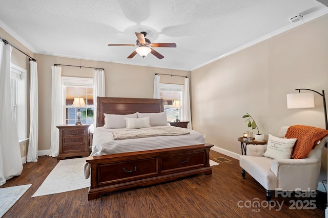 491 Paint Fork Rd, Barnardsville, NC 28709 - bedroom featuring multiple windows, baseboards, wood finished floors, crown molding, and a textured ceiling