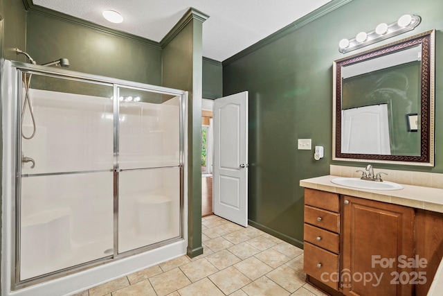 491 Paint Fork Rd, Barnardsville, NC 28709 - bathroom featuring crown molding, a shower stall, vanity, and tile patterned flooring