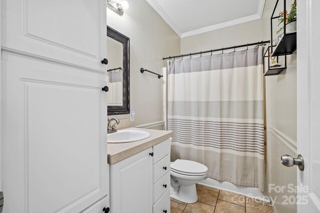 491 Paint Fork Rd, Barnardsville, NC 28709 - full bathroom with toilet, vanity, crown molding, tile patterned flooring, and shower / bath combo