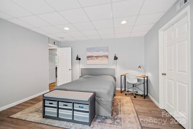 491 Paint Fork Rd, Barnardsville, NC 28709 - bedroom featuring wood finished floors, baseboards, a drop ceiling, and recessed lighting