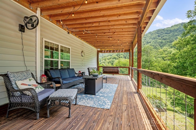491 Paint Fork Rd, Barnardsville, NC 28709 - wooden terrace with an outdoor living space and a wooded view