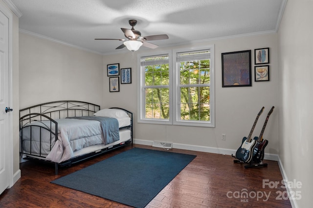 34 Edwards St, Asheville, NC 28806 - bedroom featuring hardwood / wood-style floors, ornamental molding, and a ceiling fan