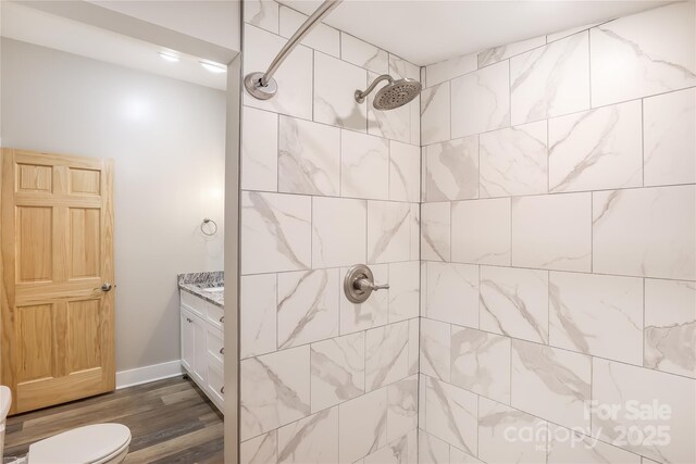 22 Moore Cir, Black Mountain, NC 28711 - bathroom featuring a tile shower, vanity, and wood finished floors