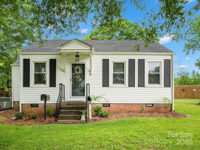 206 Charlotte St, York, SC 29745 - bungalow featuring crawl space, a shingled roof, and central air condition unit
