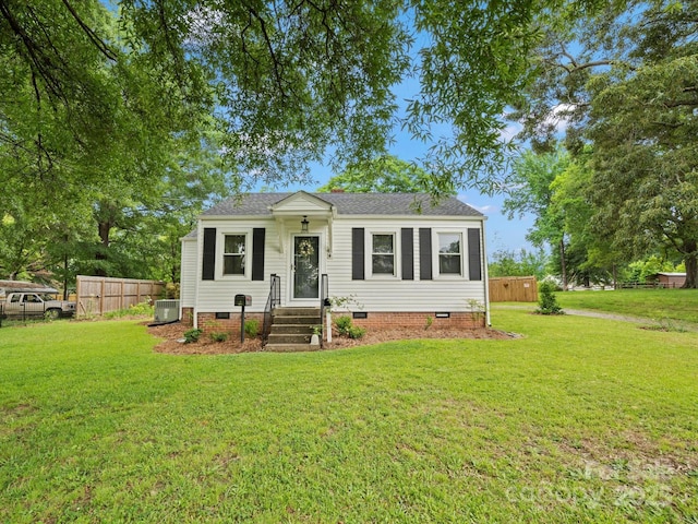 206 Charlotte St, York, SC 29745 - view of front of home featuring crawl space, central AC unit, and roof with shingles