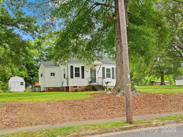 206 Charlotte St, York, SC 29745 - view of front of house with crawl space, a shingled roof, and a front lawn