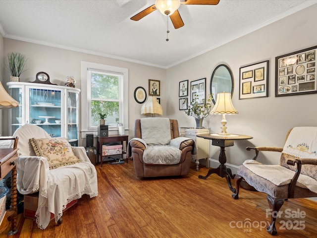 206 Charlotte St, York, SC 29745 - sitting room with ceiling fan, crown molding, and wood finished floors
