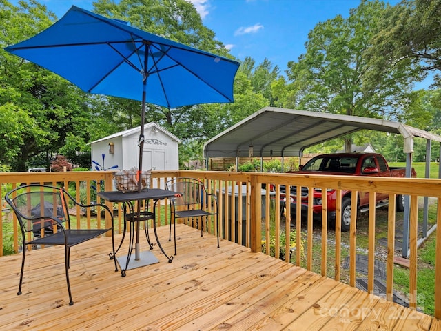 206 Charlotte St, York, SC 29745 - deck with outdoor dining area and a detached carport