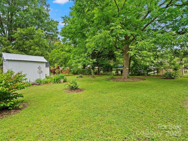 206 Charlotte St, York, SC 29745 - view of grassy yard featuring an outbuilding