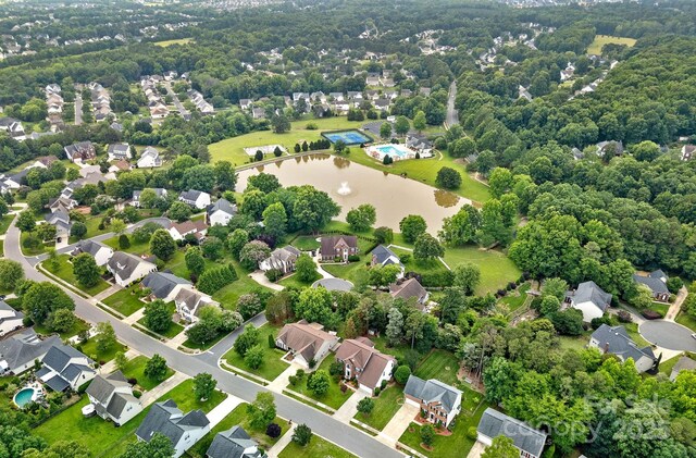 3830 Waters Reach Ln, Indian Trail, NC 28079 - aerial perspective of suburban area featuring a large body of water